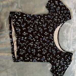 woman’s low shoulder crop top